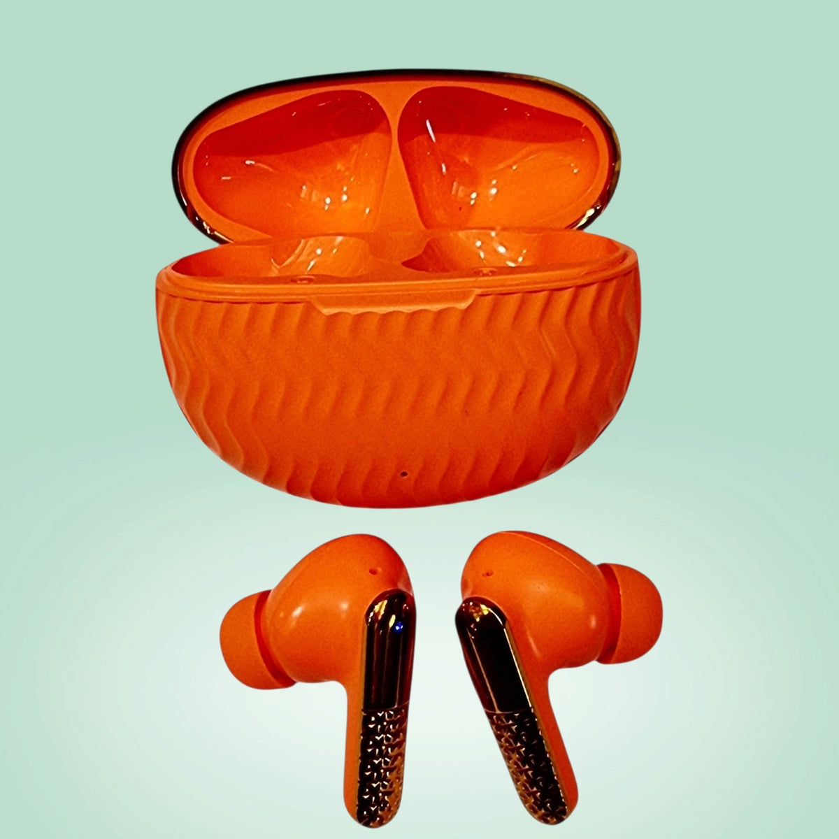ADNAN MOBILE SHOP EarBuds 6 in bright orange with a textured charging case and metallic gold stem accents
